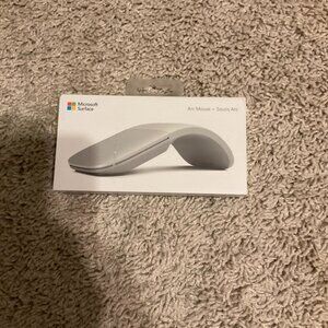 The Microsoft Surface Arc Bluetooth BlueTrack Ambidextrous Mouse in light grey